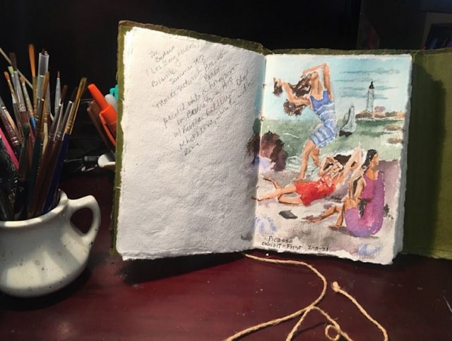 An open book with a picture of a woman on it An open book with a picture of a woman on it